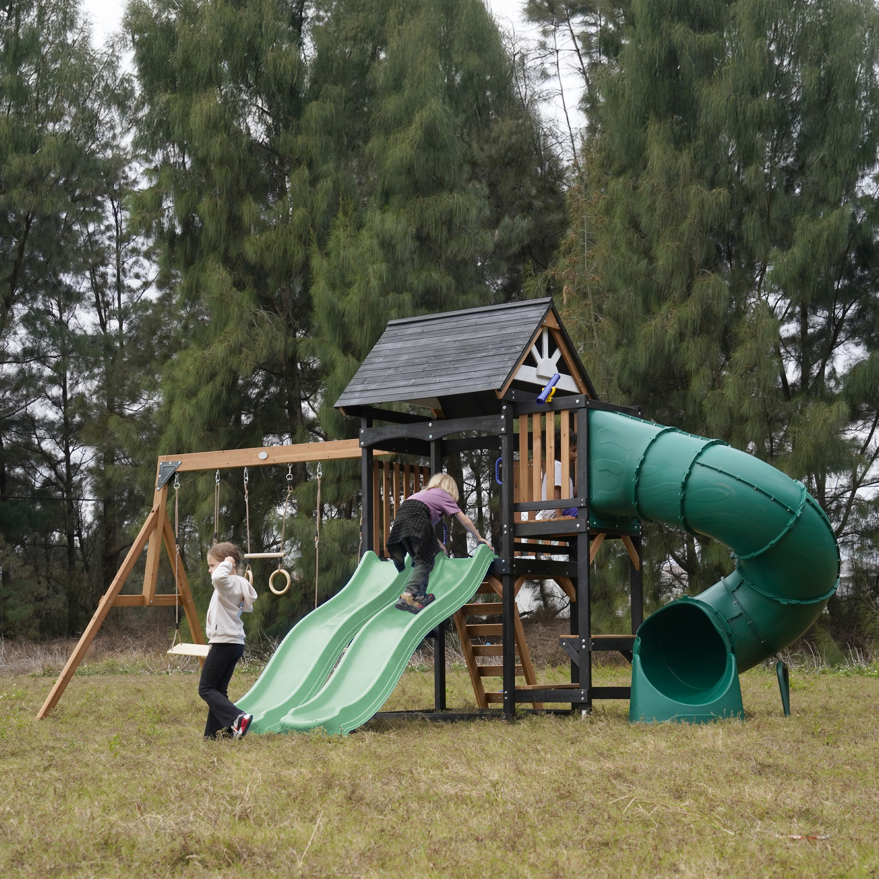 AXI Cody Climbing Frame with Swings, Trapeze and Climbing Wall – Pastel Green Double Slide and Tube Slide