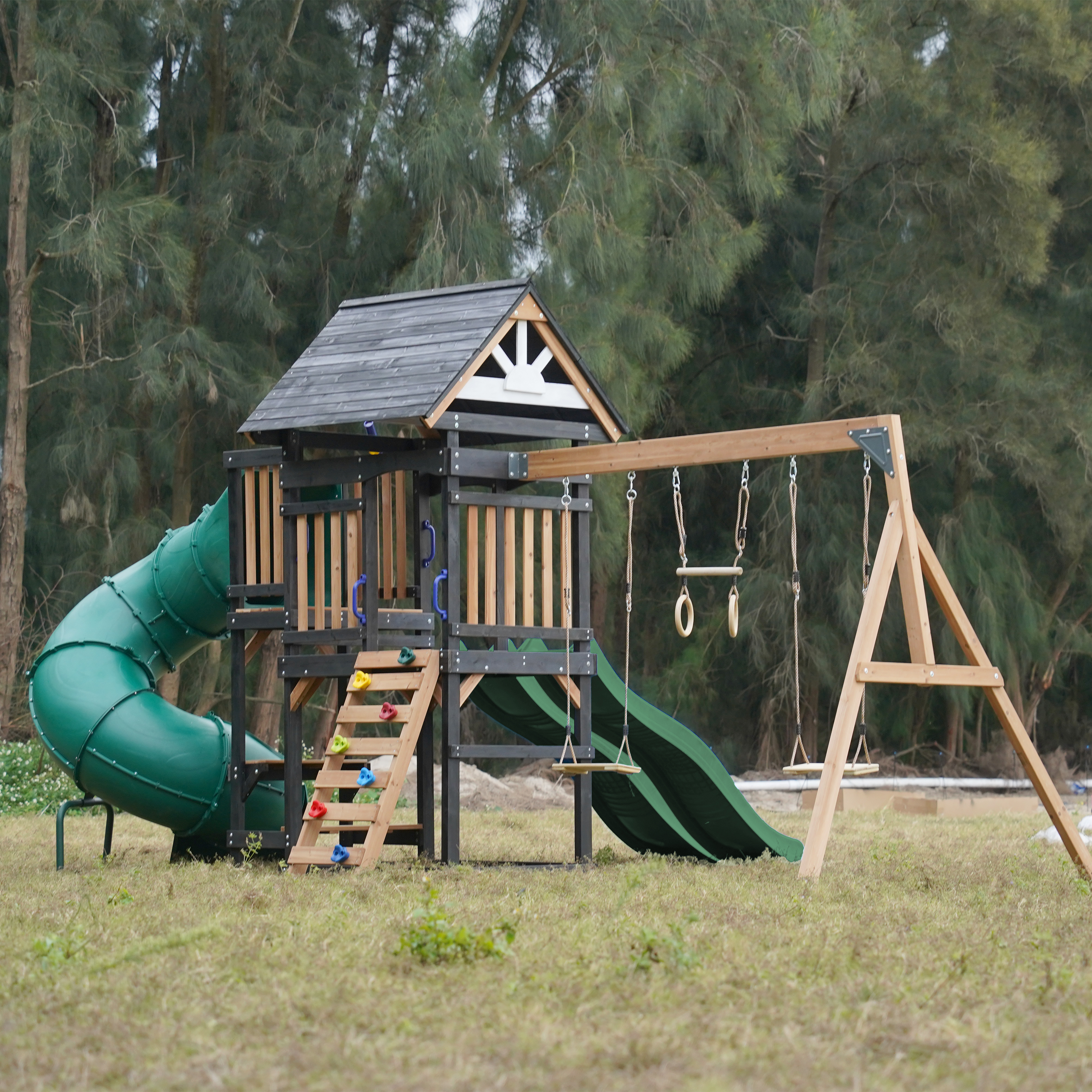 AXI Cody Climbing Frame with Swings, Trapeze and Climbing Wall – Green Double Slide and Tube Slide