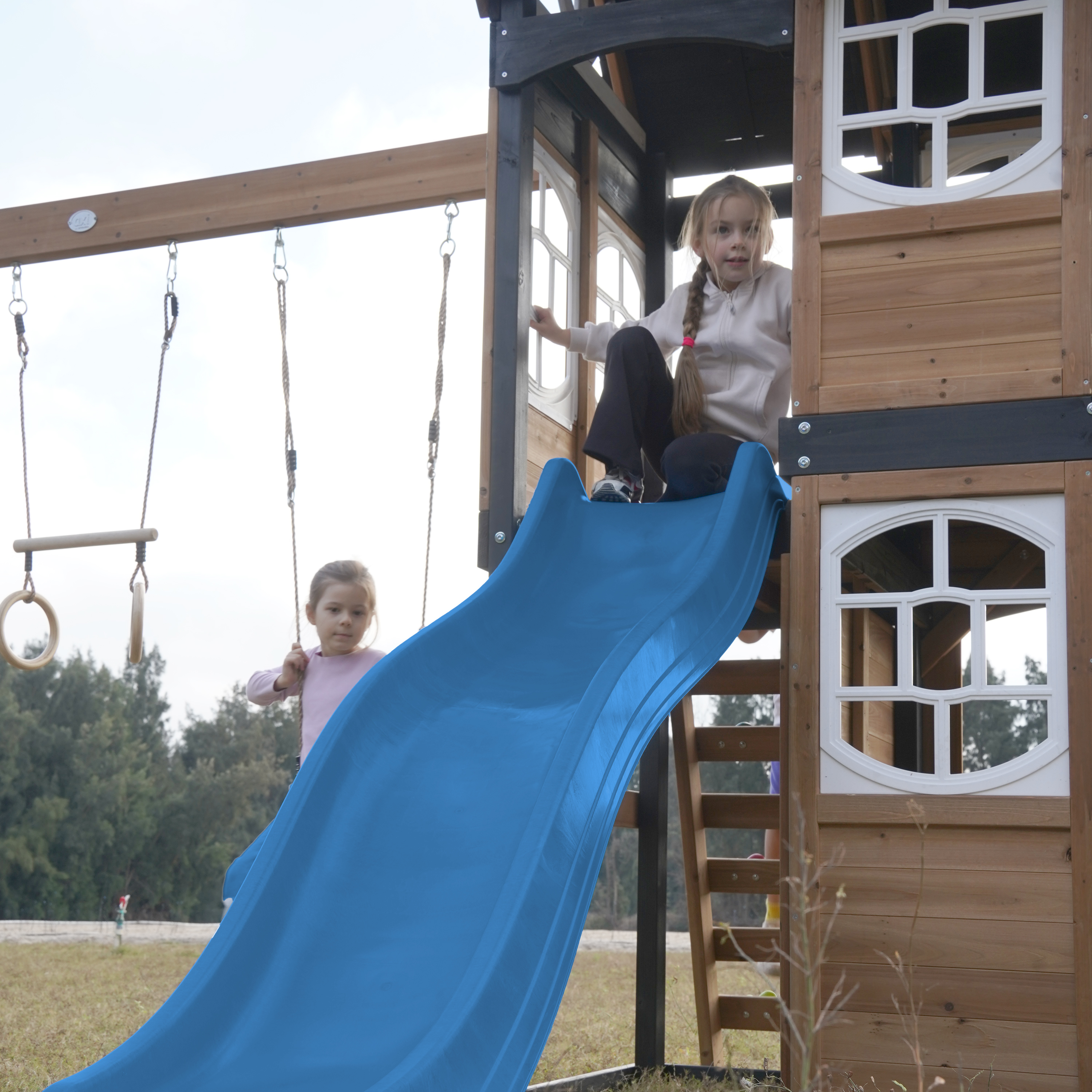 AXI Noud Climbing Frame with Playhouse, Swings, Trapeze and Climbing Wall – Blue Slide and Tube Slide